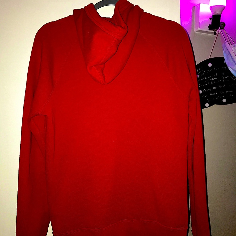 Red Abercrombie and Fitch hoodie.